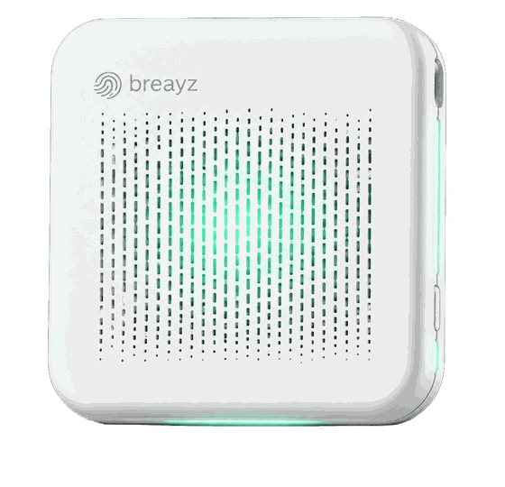 The Breayz portable air sensor, a white pocket device with a green glow.